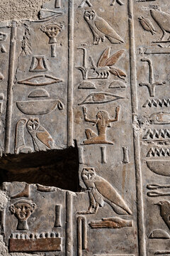 A closeup detail shot of stone carvings of Egyptian hieroglyphs in the Temple ofHatshepsut, Luxor. Egypt