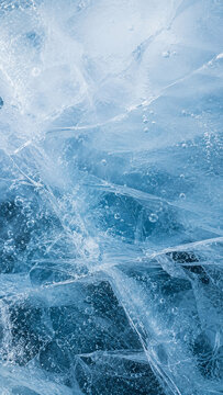 Blue translucent ice texture with trapped bubbles and crystalline cracks, vertical abstract winter nature background for clean mobile wallpaper.