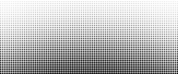 Dotted halftone gradient texture. Fading polka dot background. Repeated dots gradation pattern background. Black vanishing comic pop art overlay backdrop. Halftone raster effect wallpaper. Vector © sholeh