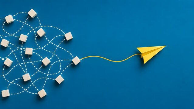 Navigating business complexity and route optimization concept featuring a paper airplane leading wooden cubes on tangled paths