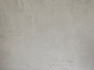 Fototapeta premium Light gray plaster wall texture with smooth cement finish. Minimal concrete background for construction, renovation, interior design, architecture and graphic design with copy space.
