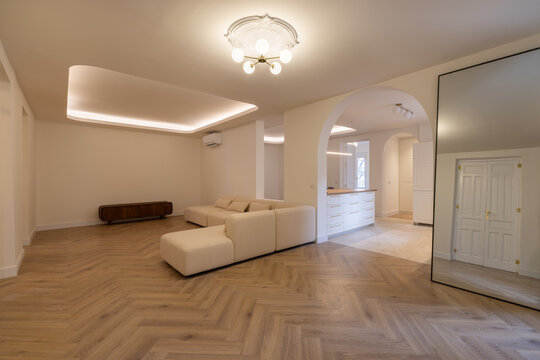 Open Living Area With Arch