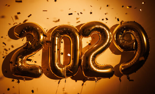 Gold 2029 balloons with confetti for new year celebration