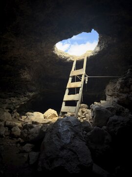 La Cova Foradada cave at the Far de Cap de Barbaria lighthouse on the southern tip of Formentera, Balearic Islands, Spain