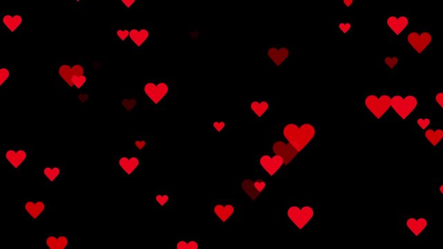 Valentines day hearts icon falling animation on black screen background.confetti hearts particular falling up.love, motion graphic video.red heart confetti falling.