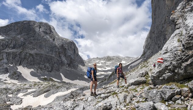 Two hikers on a hiking trail to the Hochk&ouml;nig, Salzburger Land, Austria