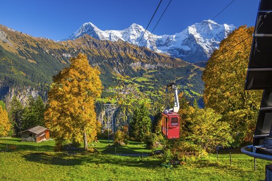 Cable car to the hamlet of Sulwald with views of Wengen, Eiger 3967m, M&ouml;nch 4110m and Jungfrau 4158m in autumn, Isenfluh, Lauterbrunnental, Bernese Oberland, Canton of Bern, Switzerland
