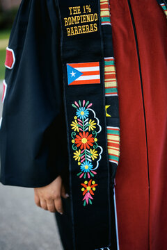 embroidery on graduation regalia of a Latina Puerto Rican doctorate 