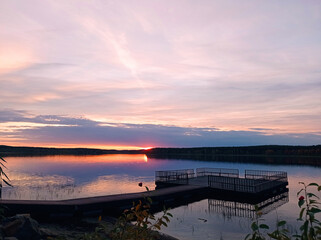 Fototapeta premium Horizontal Photo sunset lake view with pier