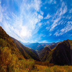 Fototapeta premium Scenic view of mountains in Kyrgyzstan during sunset