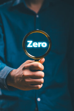 Hand holding a magnifying glass, zero defects, accidents, operational error. total quality management (TQM), thorough auditing, strict quality control eliminate business risks, problems completely.