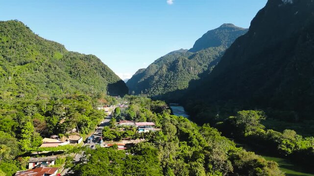 Spectacular drone flight over the dense and vibrant high jungle canopy revealing the majestic rainforest landscape of Tingo Maria, Peru.