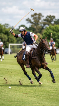 Male Polo Player Riding Galloping Horse Swinging Mallet During Competitive Match on Green Field