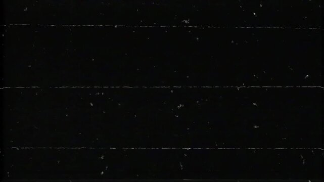 Old film tape defects frame noise grain film static texture dusty scratched dark background overlay suitable for adding vintage effect to designs.