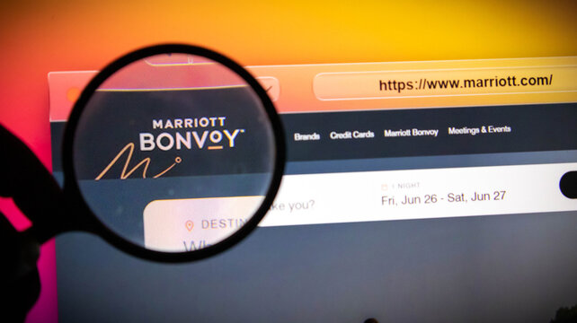 Magnifying glass over the marriott bonvoy logo on a computer screen