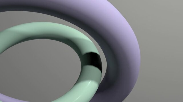 Abstract 3d looping animation of purple and gray torus rings moving in a seamless loop.