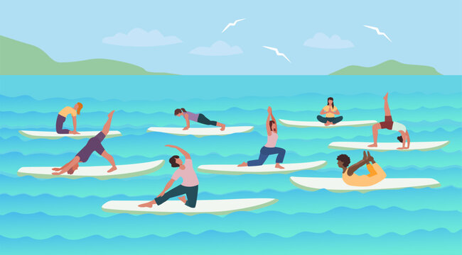 Group of women practicing SUP yoga on paddle boards in the sea. Outdoor fitness, balance training and wellness activity on calm water with coastal landscape.