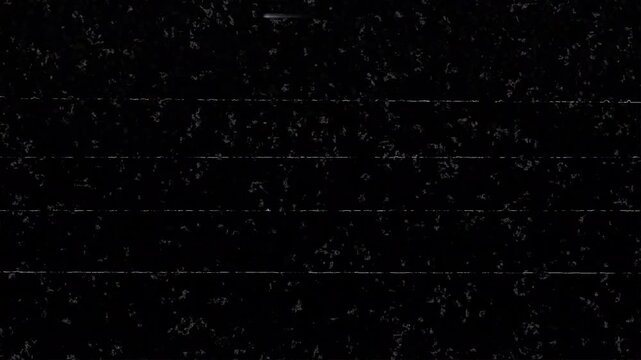 Old film tape defects. Perfect for adding a retro vibe to projects related to horror, technology, or glitch art, creating a mysterious, vintage aesthetic.
