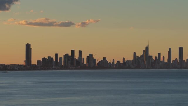 Surfers Paradise And Broadbeach Skyline During Sunrise - Gold Coast, Queensland, Australia. - aerial shot