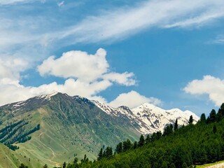 Fototapeta premium mountain landscape with blue sky and clouds
