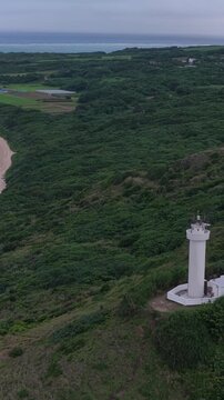 Hirakubozaki Lighthouse In Ishigaki, Okinawa, Japan - Drone, Vertical Shot