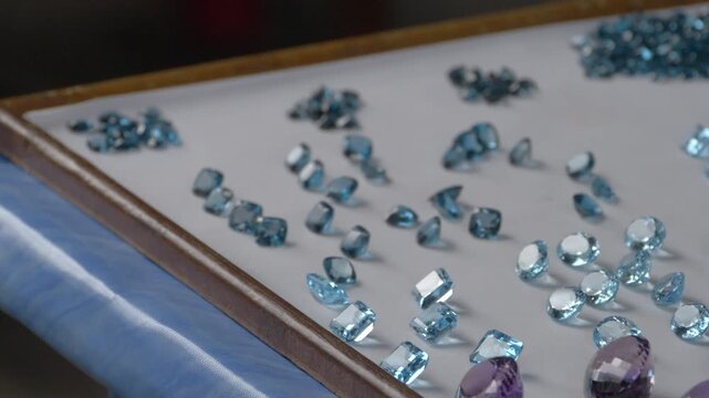 Faceted Blue Gemstones Arranged On A Display Tray At Chanthaburi Gem Market In Chanthaburi, Thailand