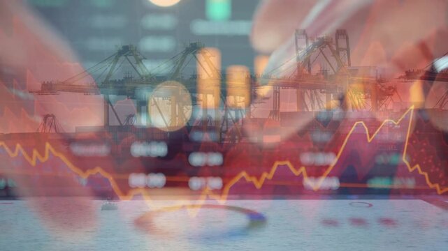 Hands holding coins with a double exposure of a cargo port and a falling red stock market chart. Symbolizes economic crisis, trade deficit, and declining logistics business.