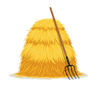 Large, golden haystack with a pitchfork leaning against it on a white surface