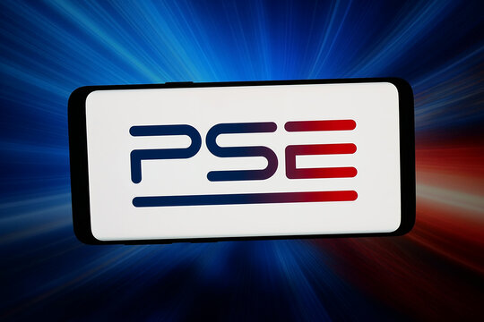 Stuttgart, Germany - 06-17-2026: In this photo illustration, the logo of Polskie Sieci Elektroenergetyczne S.A. (PSE) is displayed on a smartphone in front of abstract background on computer screen.