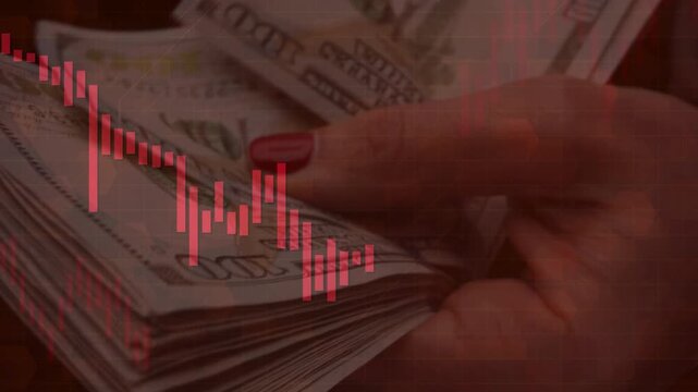 Hands counting US dollar bills heavily overlaid with a descending red candlestick chart. Depicts the concept of financial loss, stock market crash, inflation impact, and economic downturn.