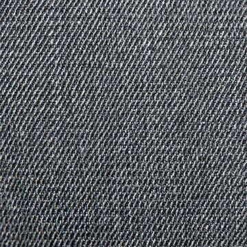 Charcoal grey denim cotton fabric texture background with diagonal twill lines