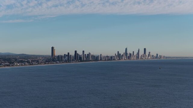 Static aerial view of the Surfers Paradise skyline across the ocean on the Gold Coast, Queensland, Australia
