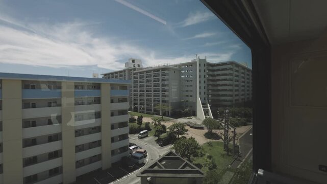 View from monorail train window, Yui Rail, Okinawa Japan