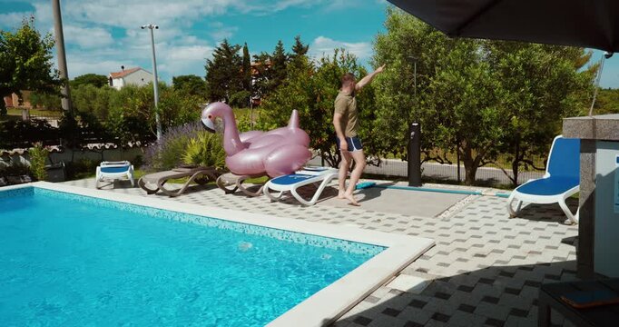 A man demonstrating and explaining the importance of showering before entering a swimming pool. Focus on hygiene rules, safety, and proper behavior at a resort pool area.
