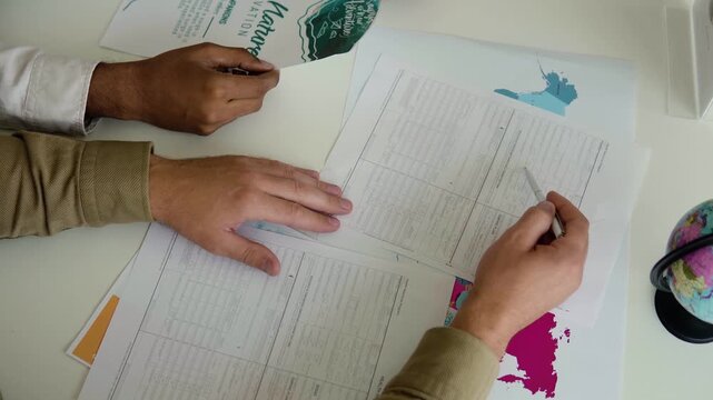 Man working with client in a travel agency