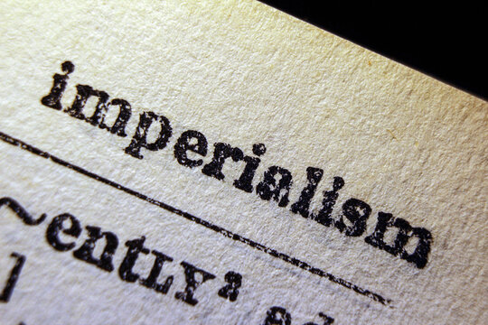 Word imperialism on dictionary page, macro close up