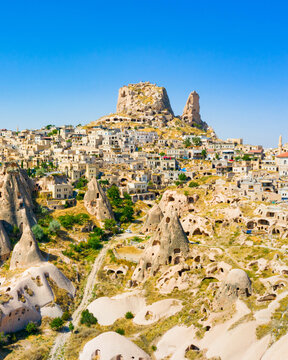 Uchisar castle in rock formation. Cappadocia. Nevsehir Province. Turkey