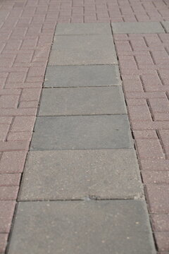 Close-up Texture of Patterned Paving Stones on Old Arbat Street, Moscow