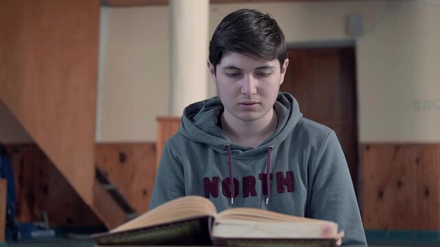 Muslim reading islamic holly book quran