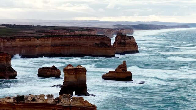 Slow aerial seascape view of Twelve apostles rocks on Australia coast &ndash; Great Ocean road.