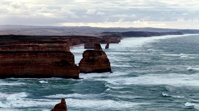 Sunbeams over scenic seascape coast at Great Ocean road Twelve apostles park.
