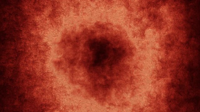 Deep red organic background featuring a soft, smoky center vignette. Ideal for moody title sequences, medical visualizations, and abstract presentations.