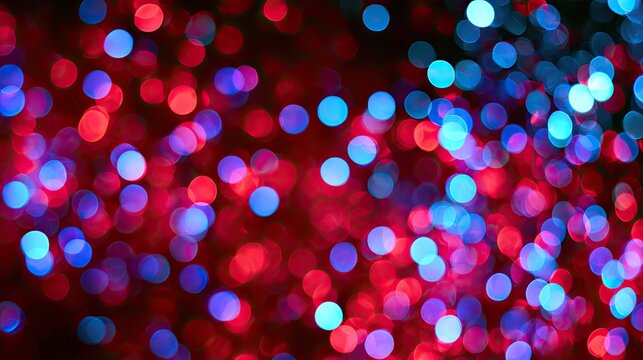 Blurred red and blue orbs create a dreamy, festive glow