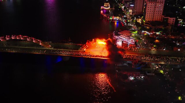 Fire-breathing Show At Dragon Bridge In Da Nang, Vietnam, During Reunification Day. Aerial Orbit Shot