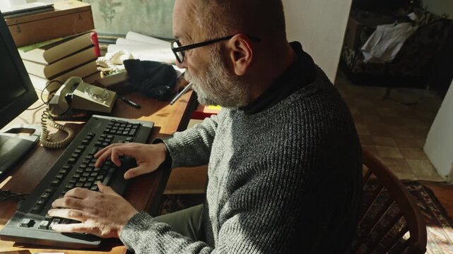 A focused writer works at an old computer beside a dial-up telephone, creating a nostalgic scene of creativity, deadlines, journalism.
