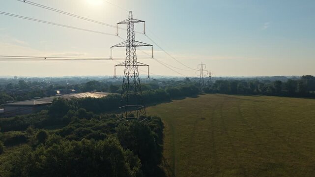 Aerial video of UK power grid, high voltage power lines in Oxford