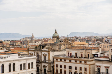 Obraz premium City view of Palermo with cathedral dome and mountains