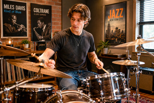 Drummer Practicing In Jazz Music Room