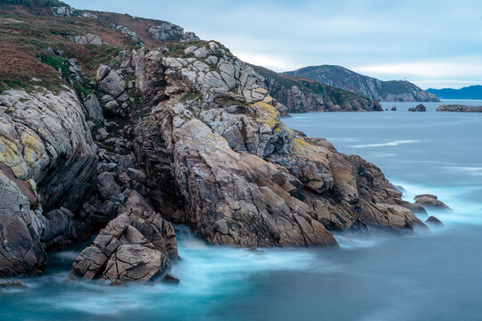 Granite rock formations in the Cliffs of Paper in San Ciprian, Lugo, Galicia, Spain.