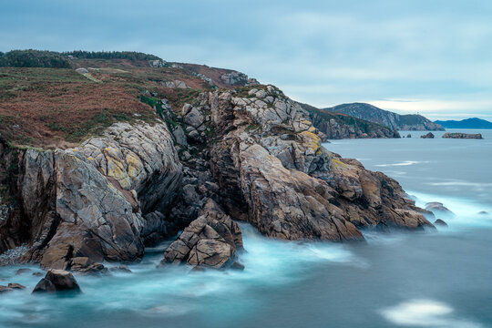 Granite rock formations in the Cliffs of Paper in San Ciprian, Lugo, Galicia, Spain.